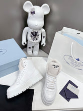 Load image into Gallery viewer, Prada Leather And Shearling High Top Sneakers