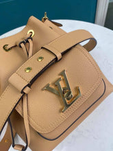 Load image into Gallery viewer, Louis Vuitton Lockme Bucket Bag - LUXURY KLOZETT