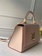 Load image into Gallery viewer, Louis Vuitton Twist One Handle MM Bag - LUXURY KLOZETT