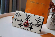 Load image into Gallery viewer, Louis Vuitton Crafty Sarah Wallet - LUXURY KLOZETT