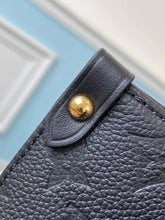Load image into Gallery viewer, Louis Vuitton Crafty OnTheGo GM Bag - LUXURY KLOZETT