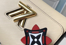 Load image into Gallery viewer, Louis Vuitton Crafty Twist MM Bag - LUXURY KLOZETT