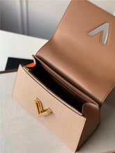 Load image into Gallery viewer, Louis Vuitton Twist One Handle MM Bag - LUXURY KLOZETT