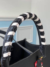 Load image into Gallery viewer, Louis Vuitton Crafty OnTheGo GM Bag - LUXURY KLOZETT