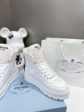 Load image into Gallery viewer, Prada Leather And Shearling High Top Sneakers