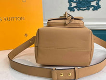 Load image into Gallery viewer, Louis Vuitton Lockme Bucket Bag - LUXURY KLOZETT