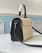 Load image into Gallery viewer, Louis Vuitton Crafty Twist MM Bag - LUXURY KLOZETT