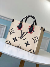 Load image into Gallery viewer, Louis Vuitton Crafty OnTheGo GM Bag - LUXURY KLOZET