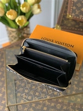 Load image into Gallery viewer, Louis Vuitton Since 1954 Zippy Wallet
