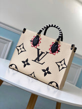Load image into Gallery viewer, Louis Vuitton Crafty OnTheGo GM Bag - LUXURY KLOZET