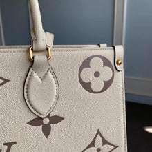 Load image into Gallery viewer, Louis Vuitton Bicolor OnTheGo PM Bag - LUXURY KLOZETT