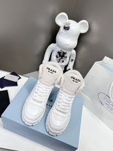 Load image into Gallery viewer, Prada Leather And Shearling High Top Sneakers