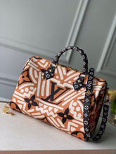 Load image into Gallery viewer, Louis Vuitton Crafty Speedy Bandoulière 25 - LUXURY KLOZETT