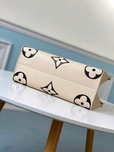 Load image into Gallery viewer, Louis Vuitton Crafty OnTheGo GM Bag - LUXURY KLOZET