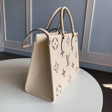 Load image into Gallery viewer, Louis Vuitton Bicolor OnTheGo PM Bag - LUXURY KLOZETT