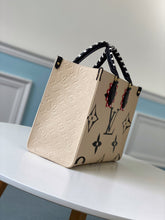 Load image into Gallery viewer, Louis Vuitton Crafty OnTheGo GM Bag - LUXURY KLOZET
