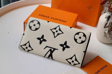 Load image into Gallery viewer, Louis Vuitton Crafty Sarah Wallet - LUXURY KLOZETT