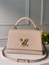 Load image into Gallery viewer, Louis Vuitton Twist One Handle MM Bag - LUXURY KLOZETT