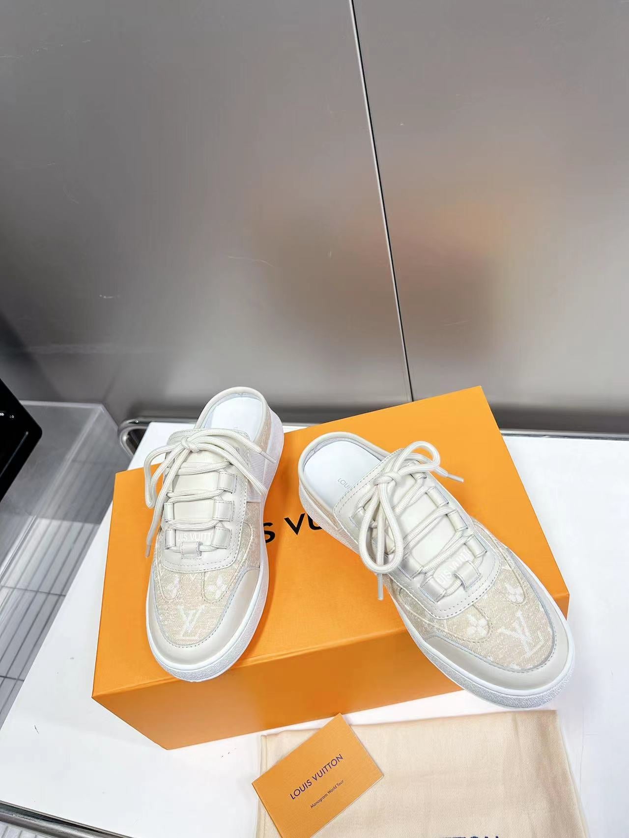 Louis Vuitton Lous Open Back Sneaker Grey. Size 38.0