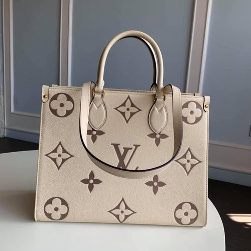 Louis Vuitton Bicolor OnTheGo PM Bag - LUXURY KLOZETT