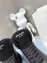 Load image into Gallery viewer, Prada Leather And Shearling High Top  Sneakers
