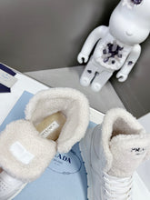 Load image into Gallery viewer, Prada Leather And Shearling High Top  Sneakers

