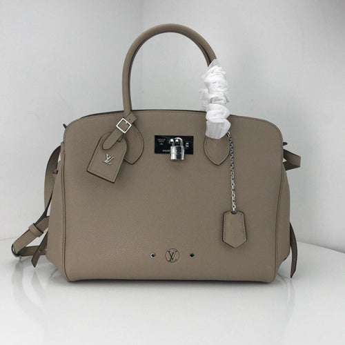 Louis Vuitton Milla MM - LUXURY KLOZETT
