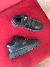 Load image into Gallery viewer, Prada Leather and Shearling  Sneakers

