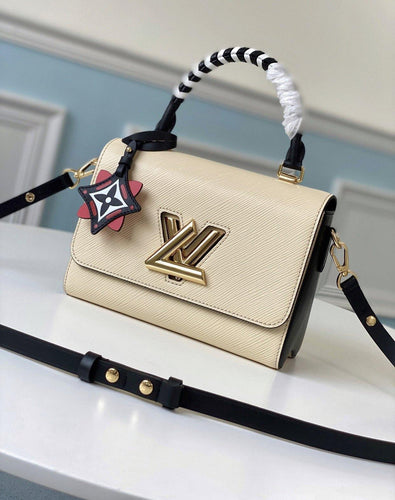 Louis Vuitton Crafty Twist MM Bag - LUXURY KLOZETT