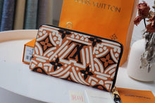 Load image into Gallery viewer, Louis Vuitton Crafty Zippy Wallet - LUXURY KLOZETT
