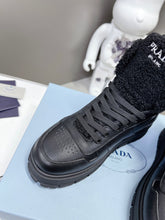 Load image into Gallery viewer, Prada Leather And Shearling High Top  Sneakers
