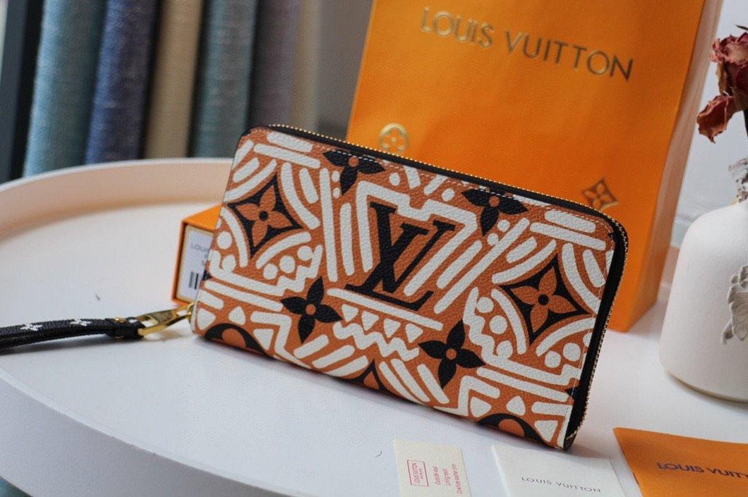 Louis Vuitton Crafty Zippy Wallet - LUXURY KLOZETT