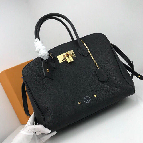 Louis Vuitton Milla MM - LUXURY KLOZETT