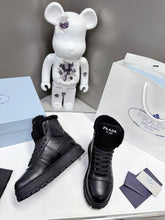 Load image into Gallery viewer, Prada Leather And Shearling High Top  Sneakers

