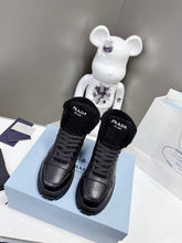 Load image into Gallery viewer, Prada Leather And Shearling High Top  Sneakers
