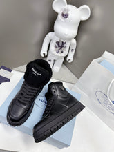 Load image into Gallery viewer, Prada Leather And Shearling High Top  Sneakers
