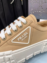 Load image into Gallery viewer, Prada Double Wheel  Nylon Gabardine Sneakers
