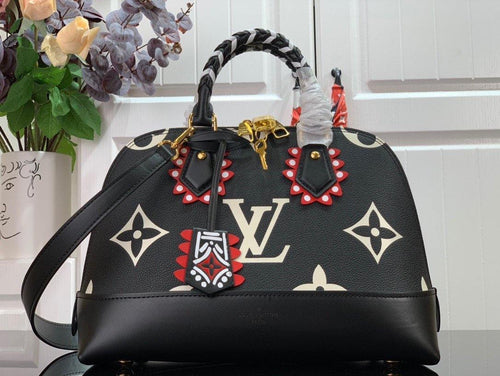 Louis Vuitton Crafty Alma - LUXURY KLOZETT