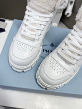 Load image into Gallery viewer, Prada Leather And Shearling High Top  Sneakers
